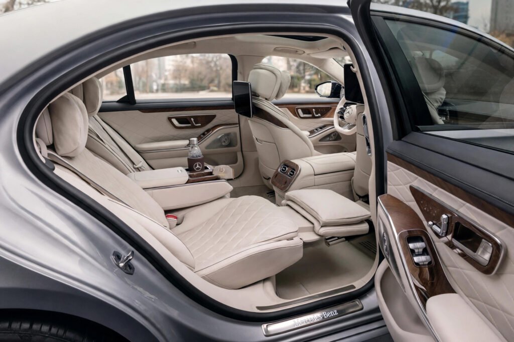 Rear cabin of a 2026 Mercedes executive saloon booked for chauffeur by the hour in Manchester