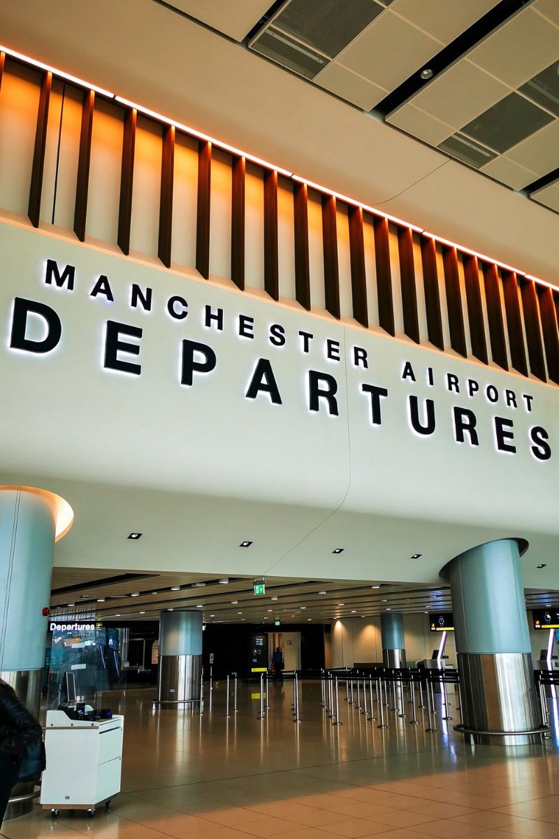 Manchester Airport Terminal 2 arrivals hall where chauffeur meet and greet pickups take place